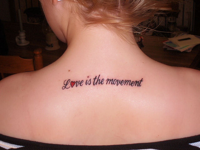 love is the movement tattoo on the back